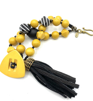 Yellow Jump Bracelet - Black Leather Tassel